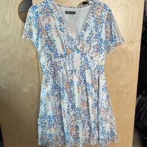 It’s a size large shin dress may be worn on time very cute and stylish